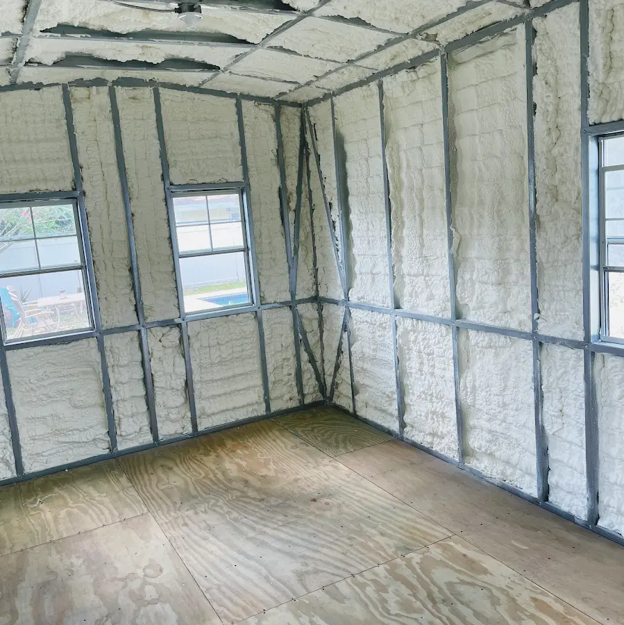 Closed-cell spray foam insulation applied to wall cavities in a residential project in Archbald